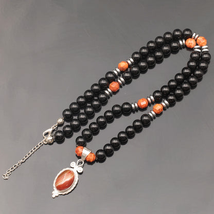Colgante de león de latón, collar de macramé con cuentas de piedra de lava y ónix negro natural