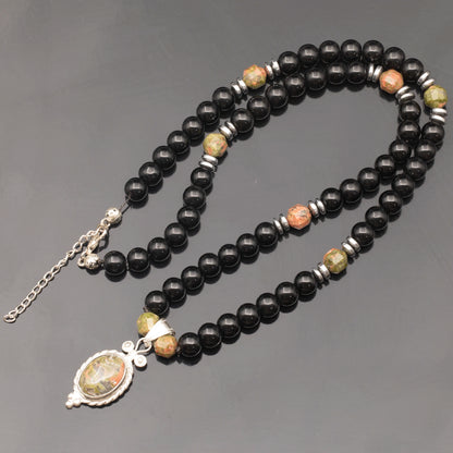 Colgante de león de latón, collar de macramé con cuentas de piedra de lava y ónix negro natural