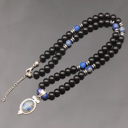 Colgante de león de latón, collar de macramé con cuentas de piedra de lava y ónix negro natural