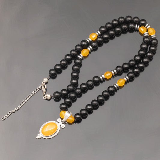 Colgante de león de latón, collar de macramé con cuentas de piedra de lava y ónix negro natural