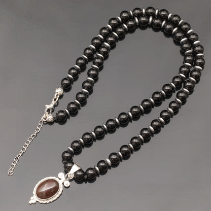 Colgante de león de latón, collar de macramé con cuentas de piedra de lava y ónix negro natural